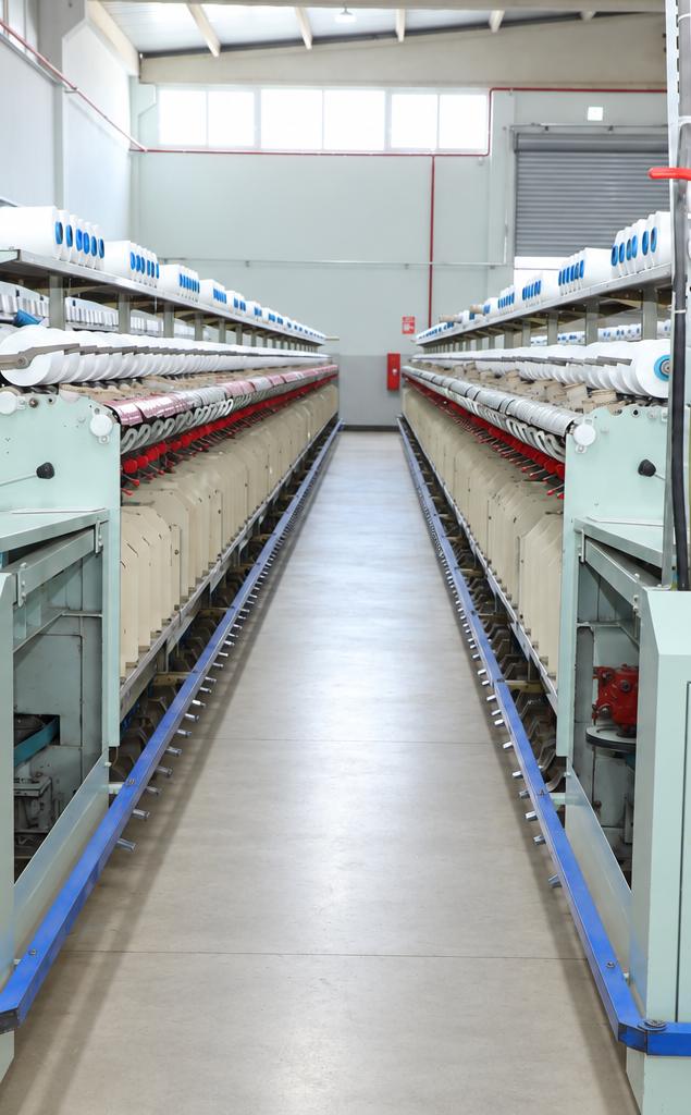 Ortasından koridor geçen büküm makineleri, Beyteks tesisi